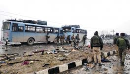 Pulwama: Indian soldiers examine the debris after an explosion in Lethpora in south Kashmir's Pulwama district February 14, 2019.  Image Courtesy: Reuters