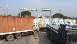 Row of trucks can be seen positioned at the Rajasthan-Haryana border. Image clicked by Ronak Chhabra