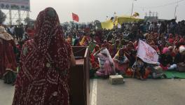 A woman managing the stage at Shahjahanpur border on Monday. Image clicked by Ronak Chhabra