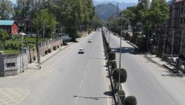 Deserted view of MA Road Srinagar during corona Lock down on Sunday.