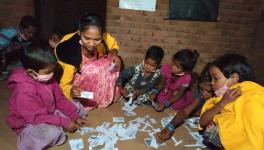 Santoshi and children at night school