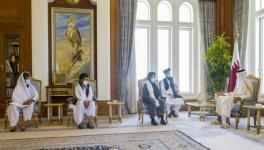 Qatar’s Emir Sheikh Tamim bin Hamad al-Thani (R) receiving Taliban co-founder Abdul Ghani Baradar (2nd-R), Doha, Sept. 2020