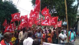 MNREGA workers protest the delay in wage payment.