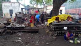 Families living at the construction site near Kashi station