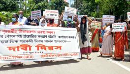 Members of the Centre of Indian Trade Unions (CITU) and GrahyaKarmi Adhikar Sangram Samiti (GASS) stage a protest as they demanding the immediate implementation of the Chief Minister Kalyani Pension Scheme, in Guwahati