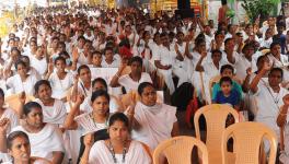 Temporary nurses protest the cancellation of paid maternity leave at Chennai’s Rajarathinam Stadium. Image courtesy: Ashwini Grace.