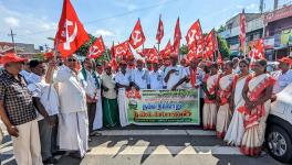 CPI(M) MP flagging off the AIKS padayatra. Image credit: Theekkathir