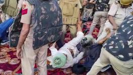 Police personnel detain farmers during their protest against the Haryana governmentâ€™s decision to not buy sunflower seeds on the minimum support price (MSP), in Kurukshetra, Tuesday, June 6, 2023. 