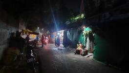 The entrance of one of the Mukhi bastis shows narrow lanes, often painted blue, and many pictures of B R Ambedkar, more than anywhere else in Steel City.