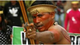 An Indigenous man pictured during a protest against the disappearance of Indigenous expert Bruno Pereira