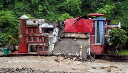 Dehradun: The Doon Defense College building collapses following incessant monsoon rains, near Dehradun, Monday, Aug. 14, 2023. (PTI Photo) (