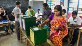 Women cast their votes for Panchayat elections at a polling station, in Nadia district of West Bengal, Saturday, July 8, 2023 