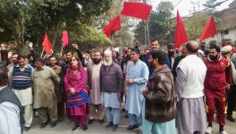 Railway Workers Union Workshop (RWUW) and Railway Workers Union Open Line (RWUOL) lead a march against privatization in Lahore, Pakistan last week. Photo: RWUW