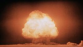 Mushroom cloud over the Trinity testing site, seconds after detonation