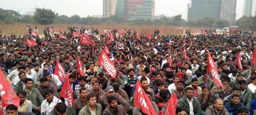 Protesting contractual staff of Honda attending a public meeting in Manesar