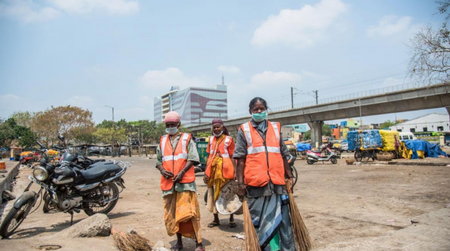 Sanitation workers.