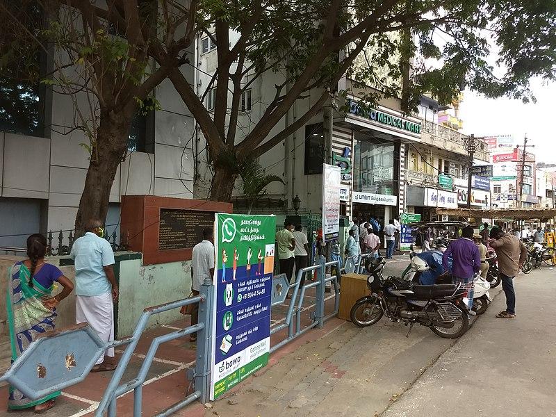 People standing in queue in Tirupur, Tamil Nadu to buy medicines.