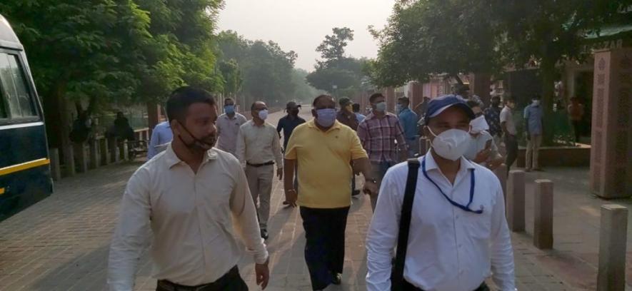 Deepak Dhan, President of Uttar Pradesh Tourist Guide Association along with his colleagues after the Taj Mahal was reopened for general public in October last year