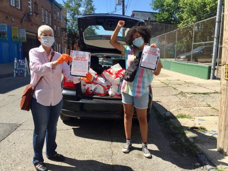 Philadelphia Liberation Center volunteer Mecca poses with Nilda of the Norris Square Community Action Network. Photo: Philadelphia Liberation Center