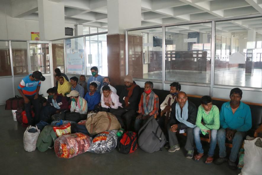 Non local laborers waiting for train inside railwaysation Nowgam. Photo by Kamran Yousuf