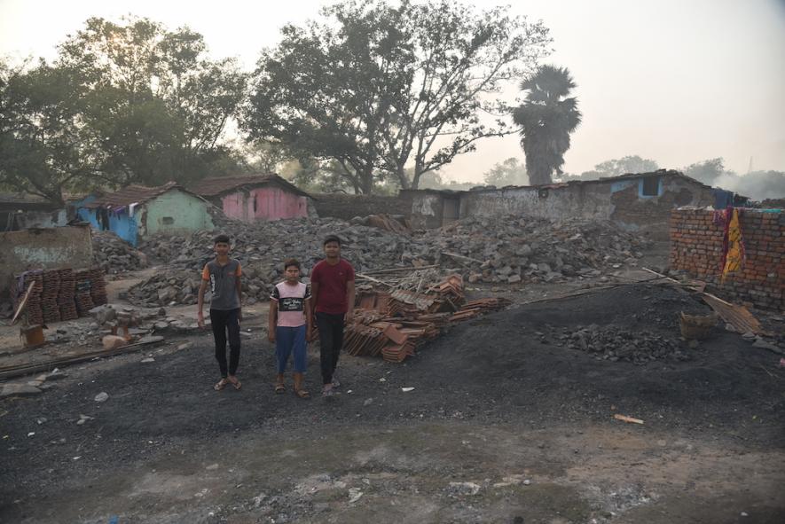 Families continue living dangerously in Barafkal New Colony close to the Rajapur Open Cast Mines in Dhanbad where land subsidence and underground fires is common