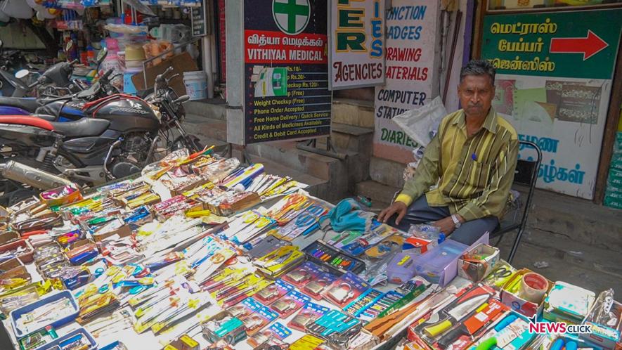 Street vendor Anbazhagan selling tools in MG Road.