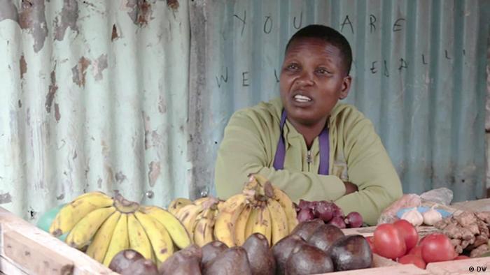 Josephine Oguta, a kiosk owner in Nairobi, says the cost of living has nearly doubled