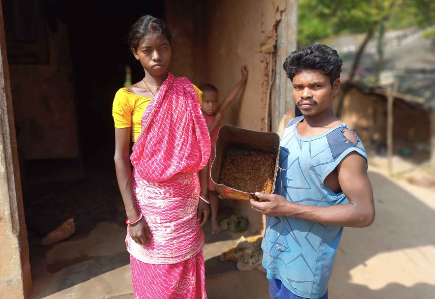 Nimai with his wife Sonamoni showing ant eggs