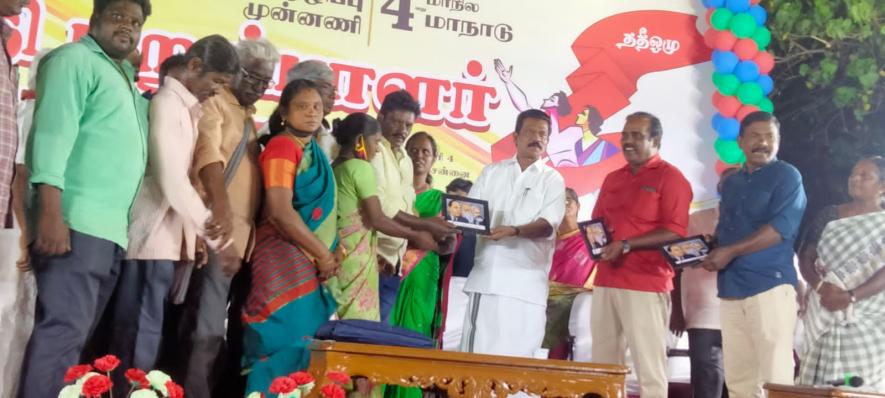 K Radhakrishnan of DSMM honouring the intercaste couples in the public meeting.