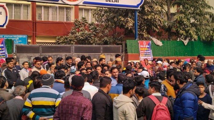 People gathered outside the Sultanpuri police station demanding stern punishment for men accused in Sultanpuri road accident.