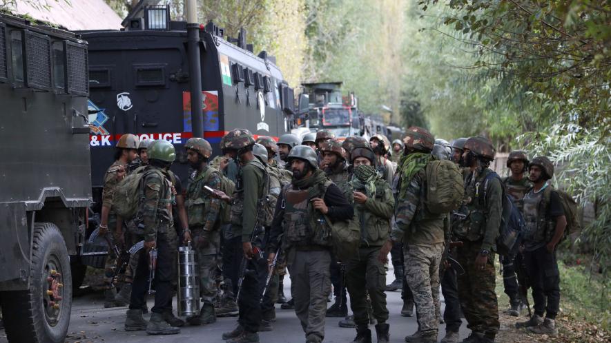 Armed Army personnel on their way to the encounter site in Gandole, Kokernag in Anantnag District on Saturday.