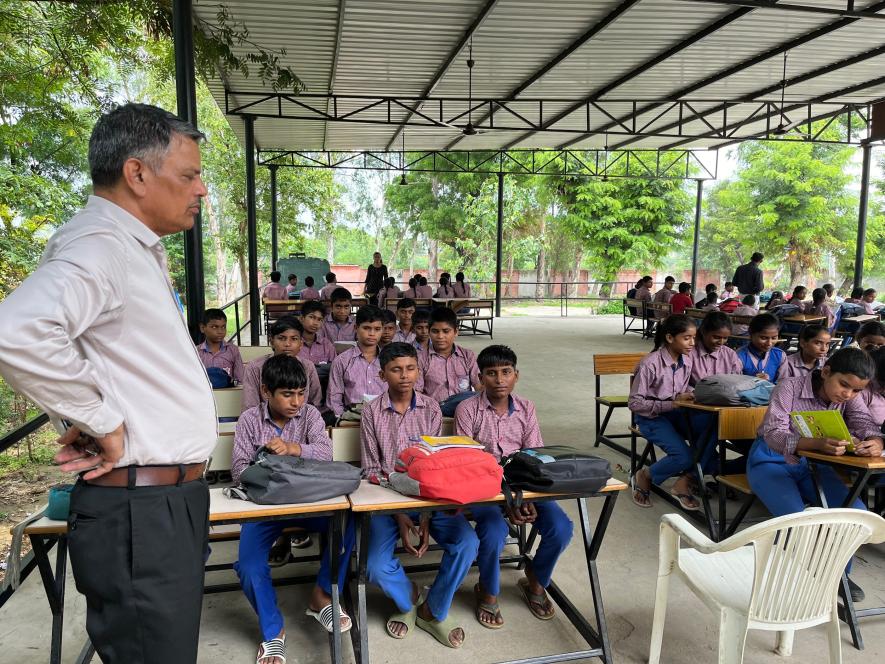 Classrooms under a shed in a government school in Kasandi, Sonipat district.