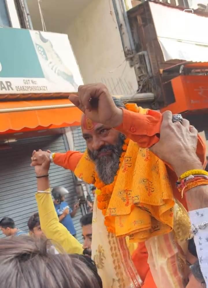 Vikas Verma, Bajrang Dal leader, was garlanded and taken around in procession after his release from police custody in Paltan Bazaar, Dehradun on Friday.