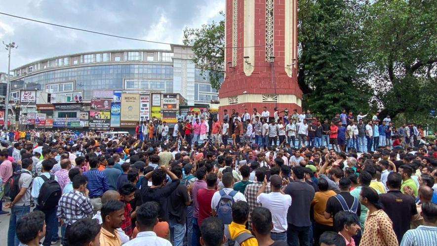 Members of Right wing Hindu organisations affiliated to ruling BJP/RSS blocking the main Clock Tower Road demanding the release of Bajrang Dal leaders in Dehradun on Friday.