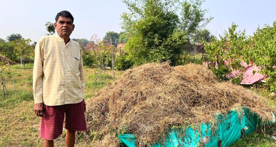 Mansingh Ahirwar poses with his vermicompost unit in Khajuraha Bujurg village in Jhansi (Photo - Sneha Richhariya, 101Reporters).