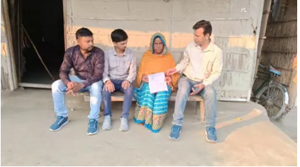 Team CJP Assam with Micharan Bibi outside her home