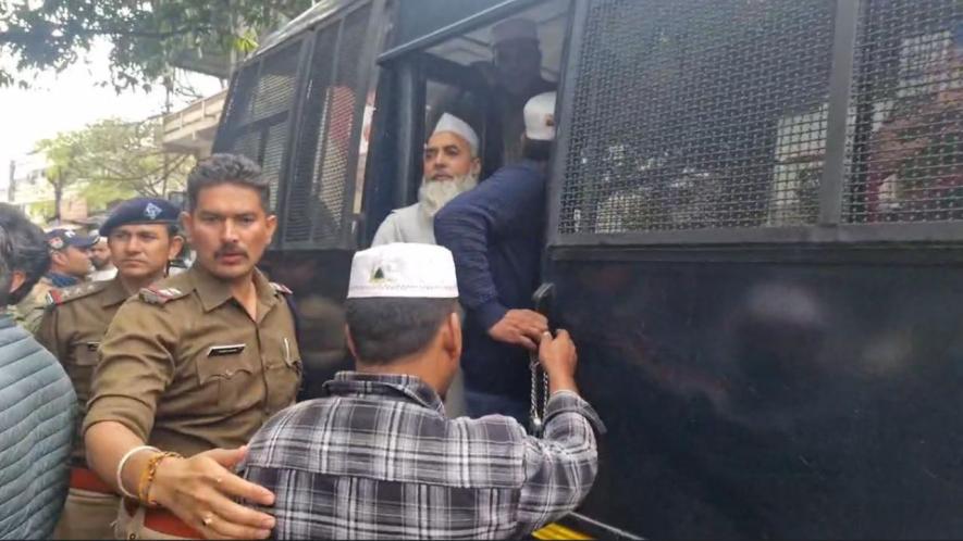 Members of the Muslim community courting arrest against administrative action against madrassas in Dehradun on March 4, 2025.